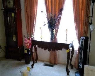 Quartz grandfather clock, Victorian table, Baldwin candle holders in glass chimneys 