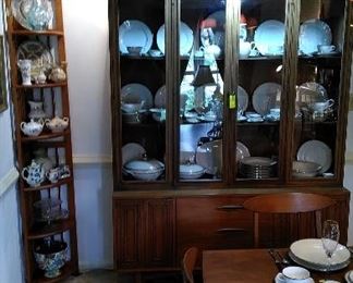 Mid Century Modern china hutch with fine porcelain china.