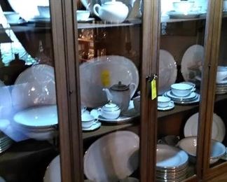 China set which includes the Demitasse pot with cups and saucers.