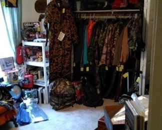 The Camo Room! Many coats, shirts, pants, overalls, gloves, boots, hats, back packs, etc. to chose from. Nascar items, Swimming fins, snow skies and boots and plenty of back to school 3 ring binders.