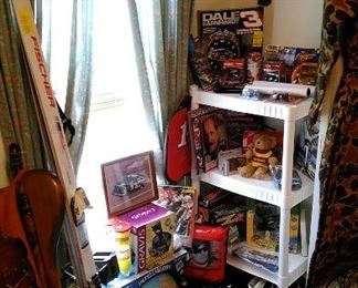 Nascar items. The wood sign says "We don't call 911"