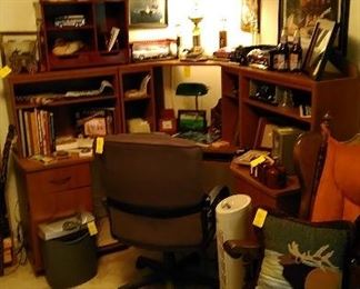 3 section desk with lamps, desk chair, back massager, Iowa Jima Cruise books, diecast cars, ships wheel suited as a picture frame and many accessories.