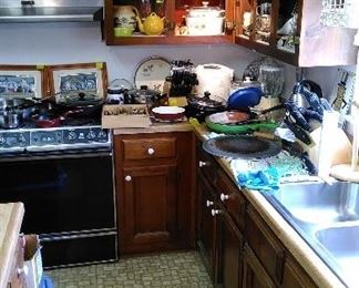 Cookware, Longaberger baskets, kitchen appliances.