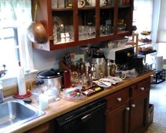 More kitchen and bar items, Tupperware, crock pot, etc.