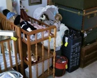 Bassinet, changing table and more dolls. Pac ‘n Play, Spider Man toddler sleeping bag.