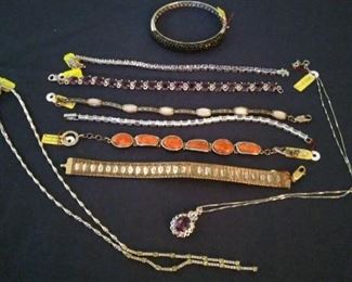 Sterling and precious stone bracelets and necklaces (not kept on the premises until the day of the sale).