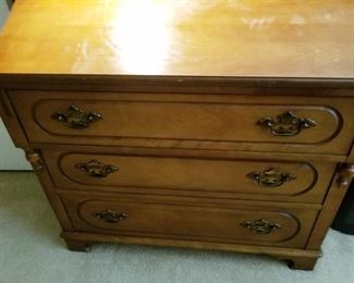 Three drawer maple chest top is bookcase 