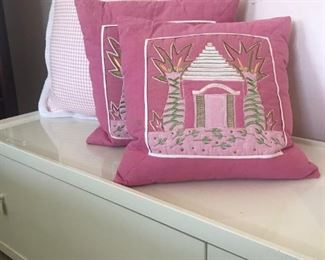 Many Charming Pillows and Window Seat 