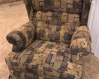 Upholstered rocker/recliner