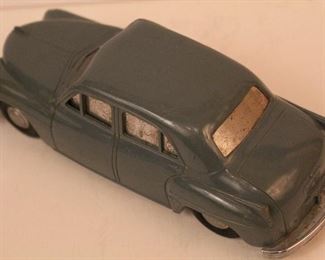 Vintage Plymouth wind up toy car