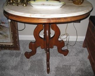 oval marble top table