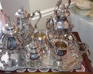 7piece Sheridan silver plate on copper tea service. Footed tray, coffee pot, tea pot, tea pot on warming stand, creamer, sugar, waste pot.