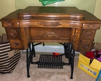 Antique White sewing machine with wood cabinet