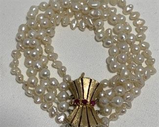 STUNNING STANDS OF BAROQUE PEARLS WITH A 14K CLASP WITH GENUINE RUBIES