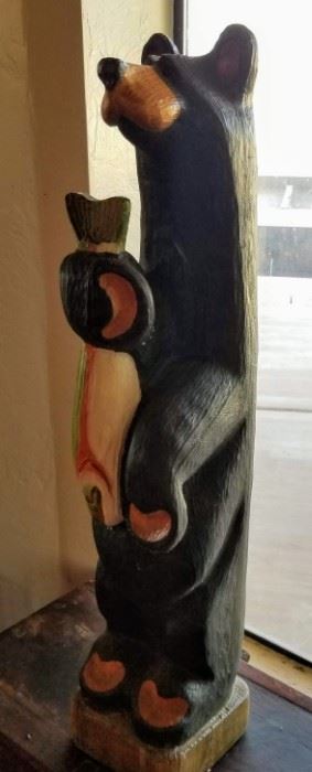 Wood Carved Bear holding Fish