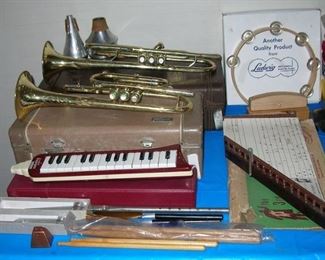 School trumpets, Ludwig tamborine mint in box, old Zither, drumsticks, tuning forks.