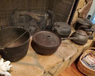Antique cast iron pots and skillets 