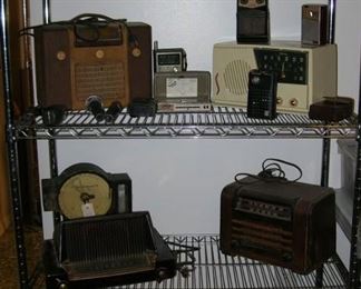 Radios, some fencing foils and a surveyers tool (I'm still looking into that) at the bottom