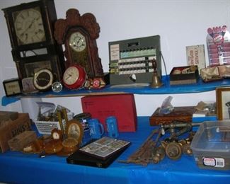 A couple old clocks, several vintage/antique doorknob sets, celluloid dresser set with a ton of matching pieces, a practice voting machine from Cook County (they still haven't gotten it right), and space for more things.