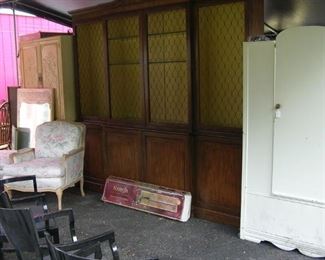 Baker curio & bookcase with wire fronts, super comfy overstuffed chair with ottoman, vintage armoire.
