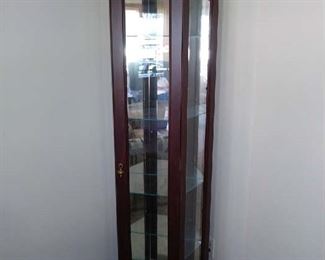 Small curio cabinet with light.