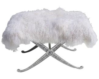 One of a pair of sheepskin and aluminum benches