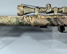 Savage Arms Model M93 17 HMR Bolt Action Rifle SN# J361816, With Mossy Brush Camo, Adjustable AccuTrigger And Scope, In Soft Case
