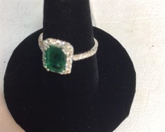 Emerals and diamond gold ring