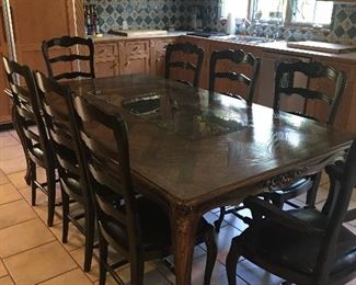 Kitchen Table, Emilio Gerard and 8 Chairs, The Table currently has Leaves in it.