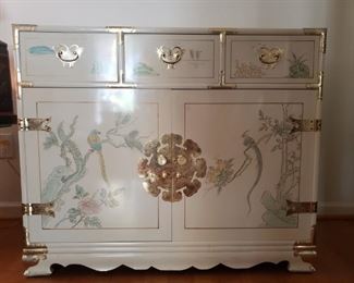 Cream colored lacquer cabinet