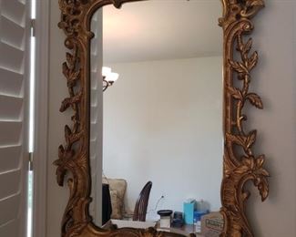Ornate rectangular gold tone mirror
