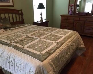 Queen bedroom suite to include: queen bed w/mattress,bureau w/mirror, armoir, two night tables, agreat buy @$850.00