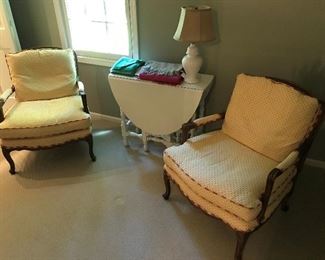 Pair of Baker Furniture French bergere chairs; nice gate leg table, painted white.