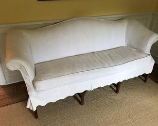 Couch with great styles and custom cover.