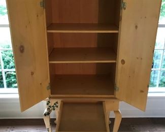 Inside look at hand-painted highboy.