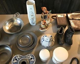 Great diversity of fun and unusual items, including a couple of vintage Hummels, baby booties, pottery, etc.