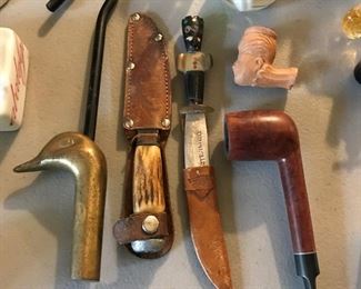 Antique knives and vintage pipes.
