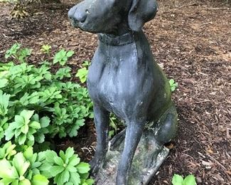 Weimaraner (or similar breed) dog sculpture.