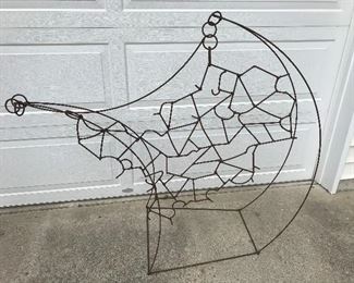 Unusual and fun metal sculpture/yard art.