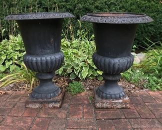 Two large metal planters.