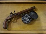 beautiful reproduction black powder pistol with lead shot