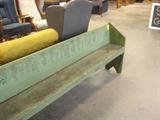 green primitive bench with stencil grapevine