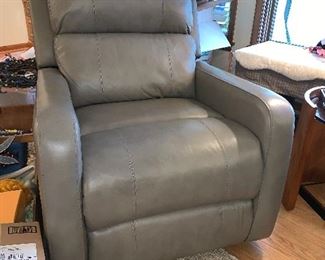 2 of 2 matching gray leather rockers/recliners