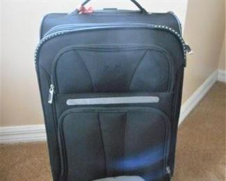 Jeep brand suitcase - 21 1/2" tall & 10 3/4" deep      https://ctbids.com/#!/description/share/209080