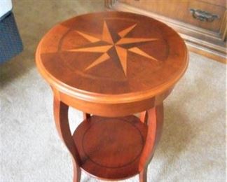 Round inlaid wood side table https://ctbids.com/#!/description/share/209103
