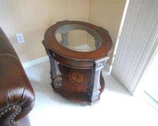 Oval wood and glass end table - 29"l x 24"w x 24"t https://ctbids.com/#!/description/share/209100              
