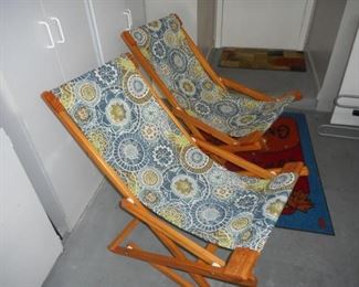 Lot of 2 wood frame and fabric patio chairs https://ctbids.com/#!/description/share/210482