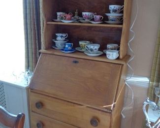 drop front bookcase/desk, teacups & saucers