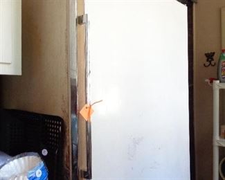 older upright freezer