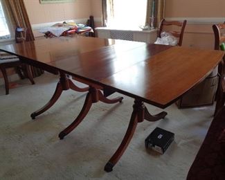 mahogany Duncan phyffe table w/2 leaves, 6 chairs w/needlepoint seats